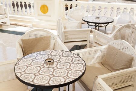 Round marble stone tables in the outdoor restaurantの写真素材