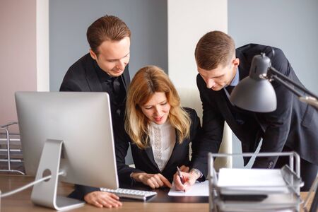Business team at computer in the officeの写真素材
