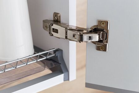 Door hinge of cabinet for drying dishes. Wide angle hinge,の写真素材