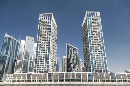 Office and residential skyscrapers in business district Dubaiの写真素材