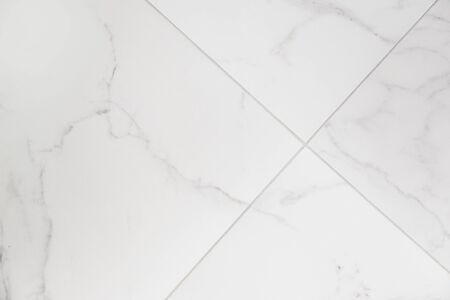 Ceramic tile with marble texture. Diagonal layout of tilesの写真素材