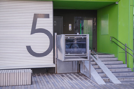 The special elevator for the disabled at the entrance to the living house