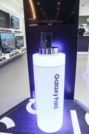 Minsk, Belarus - December 25, 2019: Viewing the new Samsung Galaxy Fold 5G. Folding touch screen...