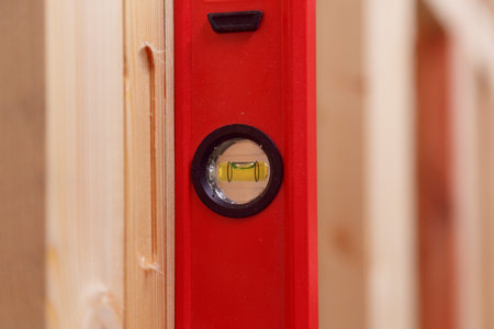 Accuracy and quality. Quality control of the construction of wooden building structures of a frame...
