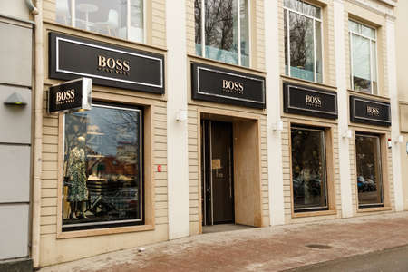 Vilnius, Lithuania - March 07: Hugo Boss boutique showcase in old town. Hugo Boss is German luxury fashion and style brend.のeditorial素材