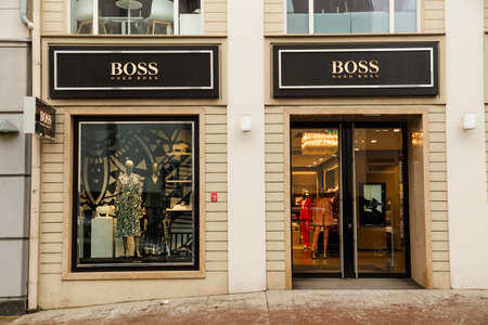 Vilnius, Lithuania - March 07: Hugo Boss boutique showcase in old town. Hugo Boss is German luxury fashion and style brend.のeditorial素材