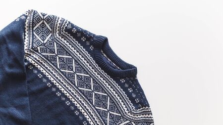Wool man blue pullover with white pattern isolated at white backgroundの写真素材