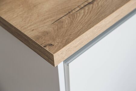 Corner of a modern kitchen worktop in the interior of a white kitchen.の写真素材