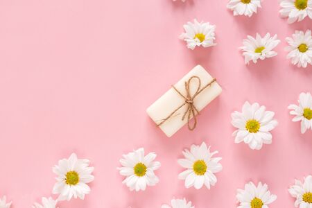 Flat lay composition with hand made soap bars and lavender flowers on violet backgroundの写真素材