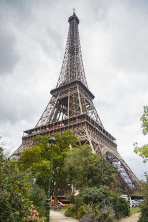 Paris, France - July 13 2019: The Eiffel Tower in overcast. Bottom view.のeditorial素材