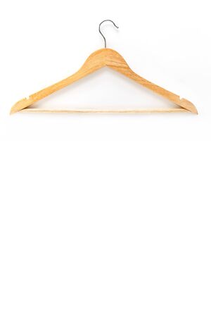 Wooden hanger isolated over white background. Mockup. Vertical image.の写真素材