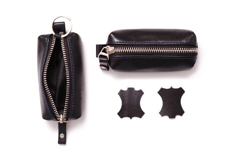 Fashionable black leather men's key holder case isolated on white background.の写真素材