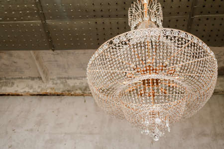 Chrystal chandelier close-up in loft interiorの写真素材