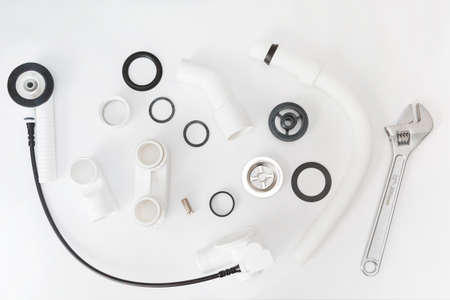 Details plastic siphon kit for bathtub on a white background.の写真素材