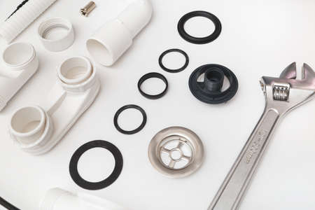 Details plastic siphon kit for bathtub on a white background.の写真素材