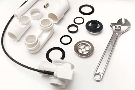 Details plastic siphon kit for bathtub on a white background.の写真素材