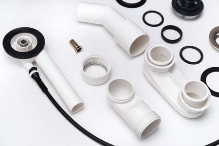 Details plastic siphon kit for bathtub on a white background.の写真素材