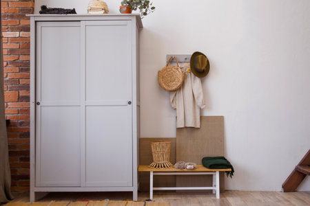 Rustic eco style interior made of natural materials. Wooden wardrobe in the roomの写真素材