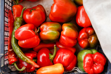 Colorful sweet bell peppers farm harvest, natural background. Flat lay, top viewの写真素材