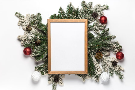 Empty wooden frame for christmas and new year menu form or invitation with fir branches and...