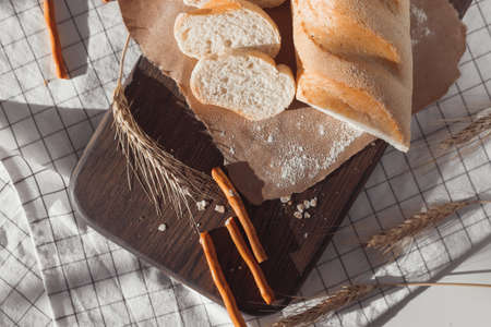 Ciabatta bread with ears of wheat.の写真素材