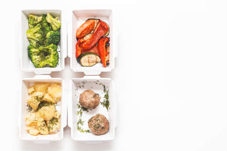 Daily food ration in containers. Delivery from restaurant, set of food healthy and balanced diet. top view, flat layの写真素材