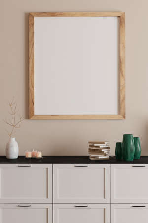 Blank framed print on white wall in beautiful danish styled interior roomの写真素材