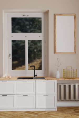 Modern scandinavian kitchen interior with window and wooden empty frame on wall. Minimalist interiorの写真素材