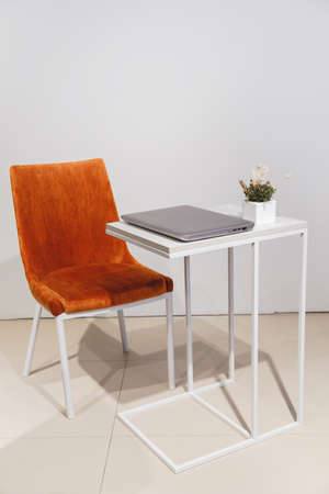 Minimalist lifestyle. laptop on coffee table side view with copy space in backgroundの写真素材