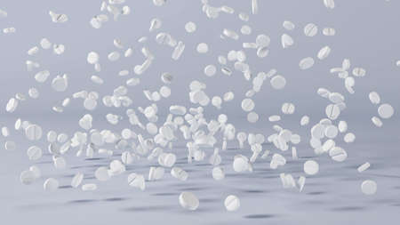 Falling medicine pills, lot of spilled white round tablets. Pharmacy industryの写真素材
