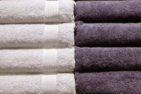 Stack of fluffy towels in store. background.の写真素材