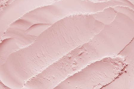 Cosmetic background, clay texture. Mask pink dry clay for face and bodyの写真素材