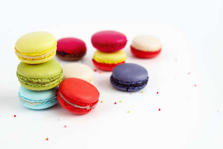 Stack of colorful macaroons or macaron isolated on white, French dessert background.の写真素材