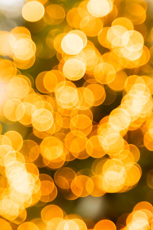 blurred, unfocused lights on christmas tree. Holiday winter holidays card backgroundの写真素材