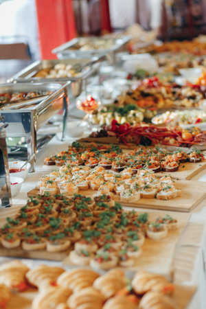 catering wedding buffet food indoor in luxury restaurant with meat colorful fruits and vegetables