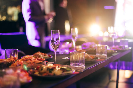 Served for banquet tables in a luxurious interior evening partyの写真素材