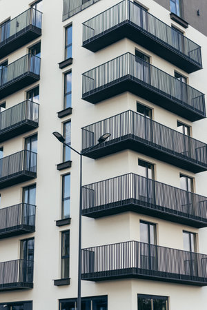 Contemporary apartment building with modern facade with balconies, residential constructionの写真素材