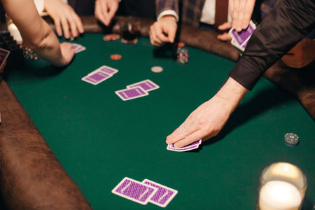 People playing poker on a evening party, entertainmentの写真素材