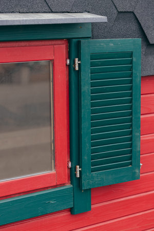 Opened windows shutters, wooden exterior designの写真素材