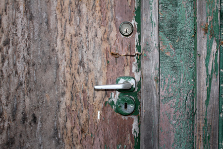 Old door, peeling paint, rustの写真素材