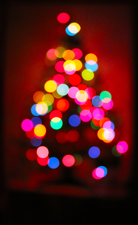 Christmas atmosphere of Christmas tree in soft focusの写真素材