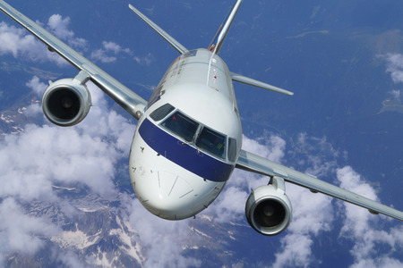 Passenger aircraft is dynamically rising into the skyの写真素材