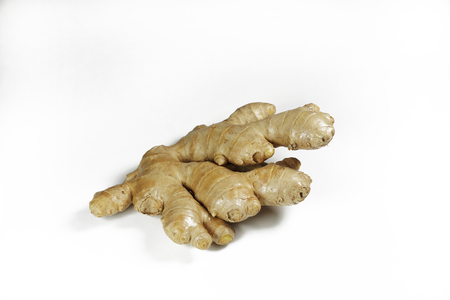 Rhizome of ginger on a white background, spice and medicineの写真素材