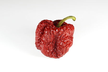 The process of aging food, old wrinkled peppersの写真素材
