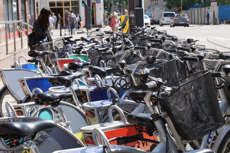 A moment when the bikes are returned to the rental station after use.の写真素材