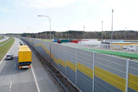 A noise-absorbing barrier (also called a soundwall, noise wall, sound berm, noise barrier, sound barrierの写真素材