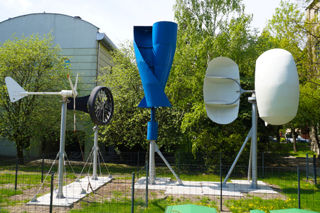 Experimental mini wind farm. Wind turbines. Four different rotor systems.の写真素材
