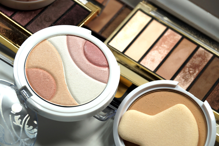 Set of eyeshadows, pressed powder, a set of warm colorsの写真素材