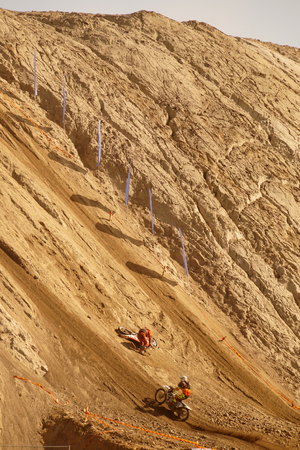 Steep uphill climb during enduro competition. Two players in action.の写真素材