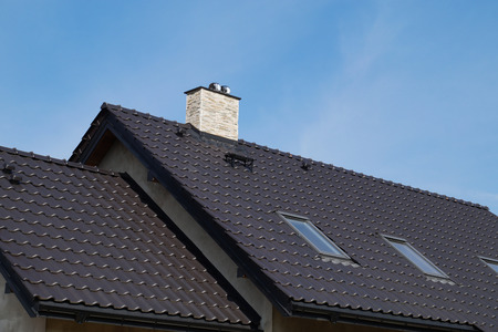 The roof in a newly built building made of ceramic tiles.の写真素材